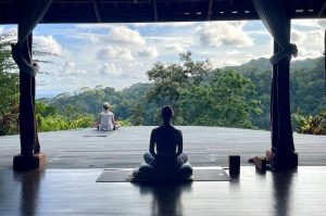 Two women meditating at retreat in Costa Rica